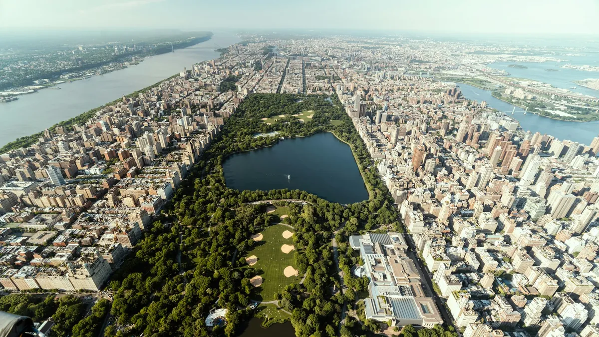 Aerial view of Central Park surrounded by Manhattan buildings