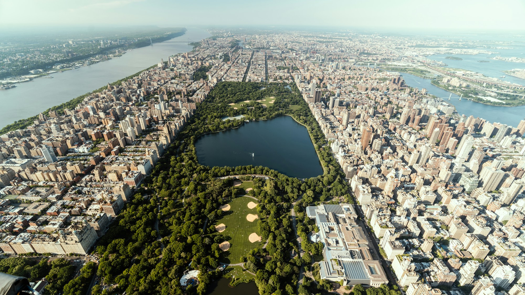 Aerial view of Central Park and surrounding Manhattan buildings
